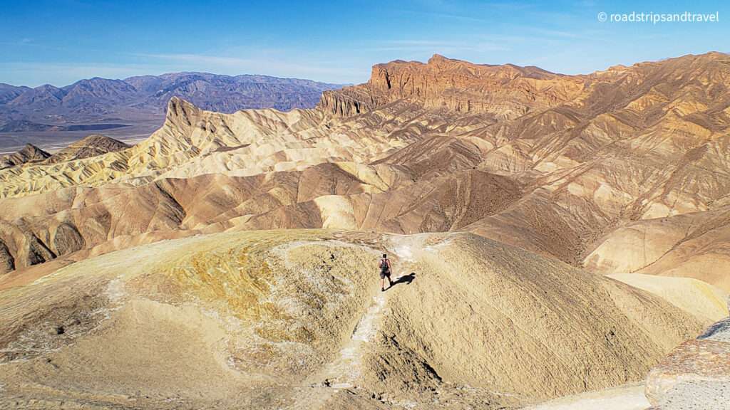 Lone hiker in the badlands